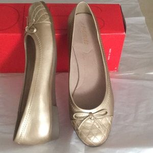 Gold flats by Aerosole